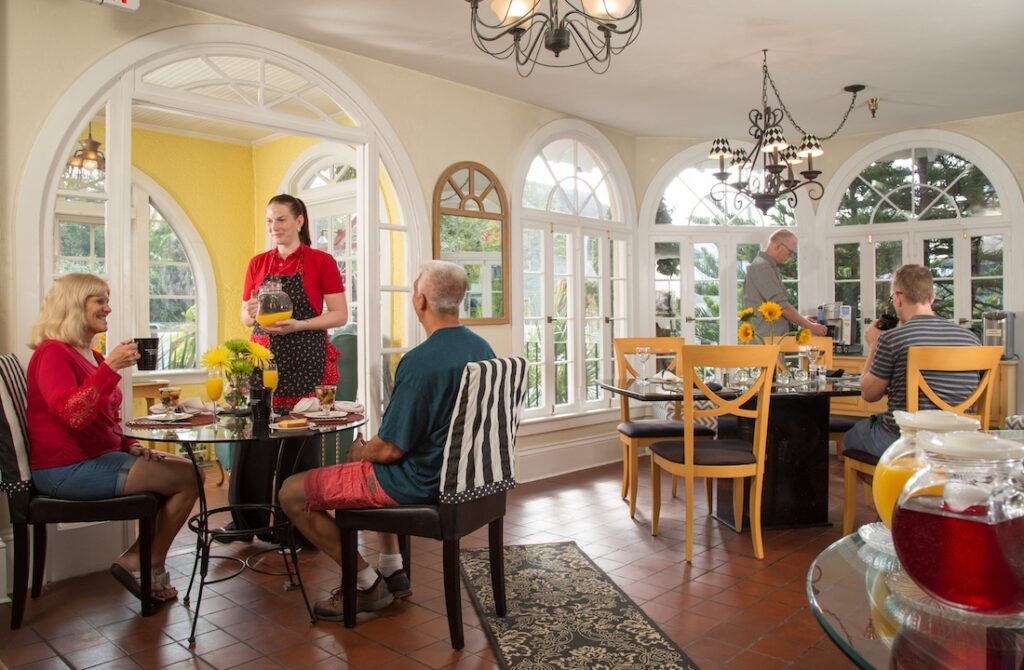 The Best Historic District Bed and Breakfast in St. Augustine, Florida 4 Bed and Breakfast in St. Augustine, photo of guests at our B&B enjoying breakfast in our dining room